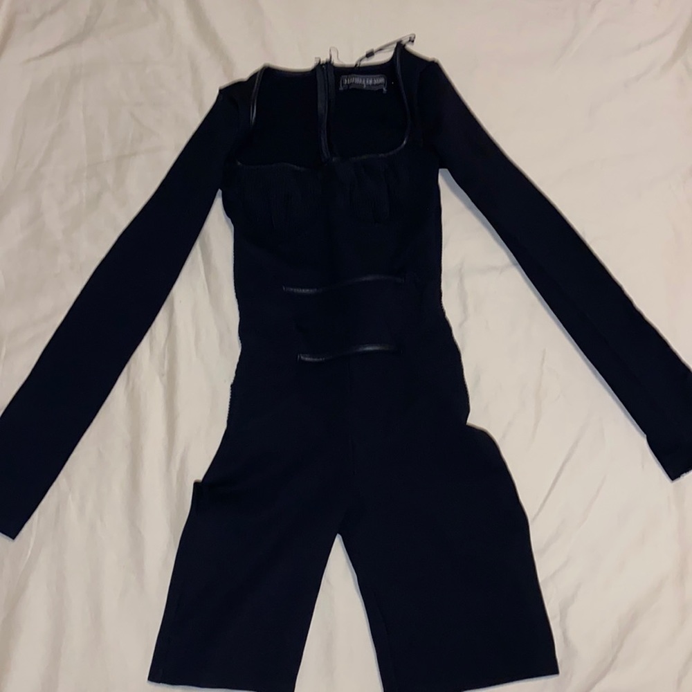 Black fitted one piece from Manière De Voir .